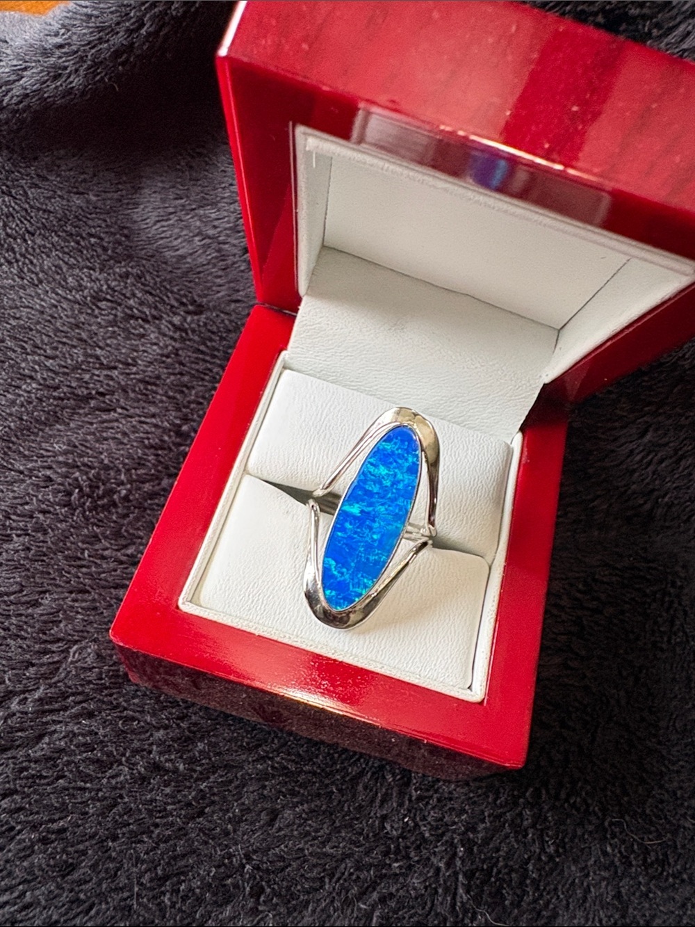 Sterling Silver Large Blue (Oval) Opal Cocktail Ring. 
Quality Artisan Jeweller.